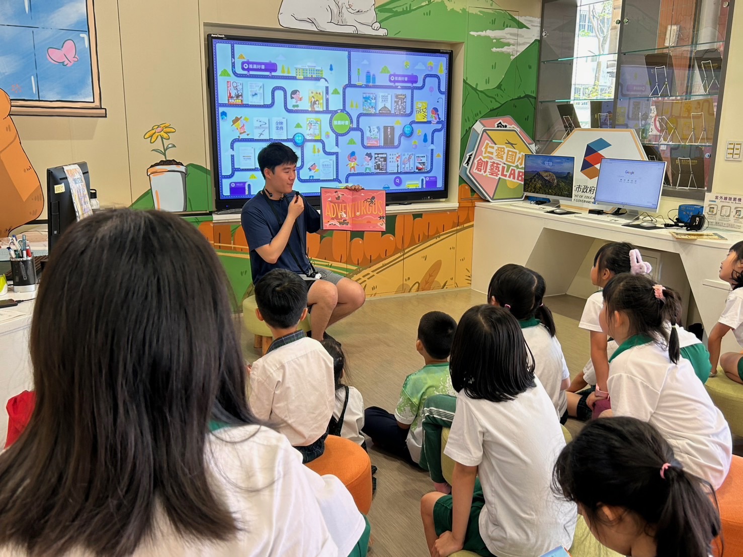 Serving students in Taiwan: Reading stories to elementary students